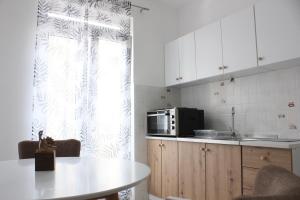 Kuchyň nebo kuchyňský kout v ubytování Apartment Luce
