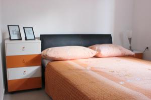 Postel nebo postele na pokoji v ubytování Apartment Luce