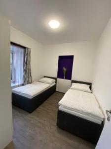 A bed or beds in a room at Kathis Juwel