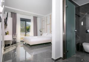 Posteľ alebo postele v izbe v ubytovaní B&D Luxury Suites