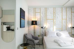 Posteľ alebo postele v izbe v ubytovaní B&D Luxury Suites