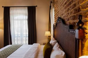 Un ou plusieurs lits dans un hébergement de l'établissement Mest Hotel Istanbul Sirkeci