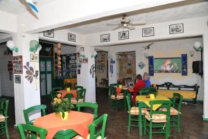 A restaurant or other place to eat at Erofili Rooms