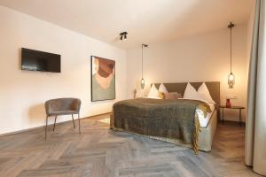 Postel nebo postele na pokoji v ubytování Townhouse by Frauenzimmer