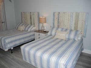 Voodi või voodid majutusasutuse 1408M condo toas +37 fotot