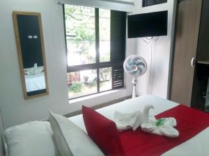 Letto o letti in una camera di Apartahotel Avanti