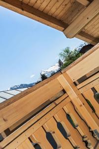 Balkón nebo terasa v ubytování Chalet Dacha mit finnischer Sauna