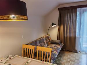 Postel nebo postele na pokoji v ubytování ATMOSPHERE Apartments