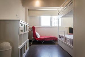 Divstāvu gulta vai divstāvu gultas numurā naktsmītnē Amazing Apartment in Costa da Caparica