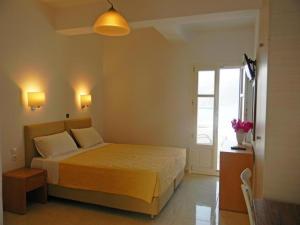 Posteľ alebo postele v izbe v ubytovaní Anatoli Rooms