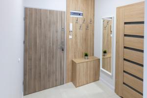 Zdjęcie z galerii obiektu Apartament 7M z Basenem w jednym budynku Rewal, free private parking, Park rozrywki HOSSOLAND 30 minut w Rewalu