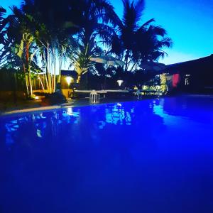 Guest House Villa 2 Santos tesisinde veya buraya yakın yüzme havuzu