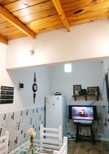 Virtuvė arba virtuvėlė apgyvendinimo įstaigoje PH 4 personas, patio con parrilla