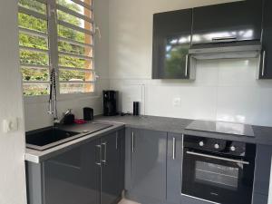 Dapur atau dapur kecil di Le Modrigue