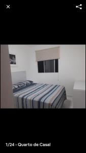 Una cama o camas en una habitación de Alugo apartamento perto de Porto de Galinhas