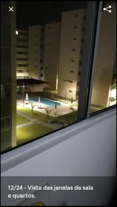 Una vista de la alberca en Alugo apartamento perto de Porto de Galinhas o alrededores
