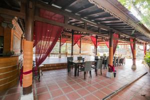 Restoran või mõni muu söögikoht majutusasutuses Ubud Hotel & Cottages
