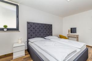 Postel nebo postele na pokoji v ubytování Villa THREE UNITS