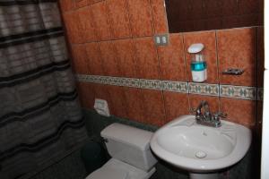 Ванна кімната в Hostal Loma Blanca