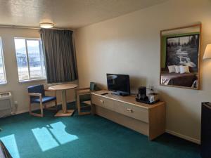 TV a/nebo společenská místnost v ubytování Horizon Hotel