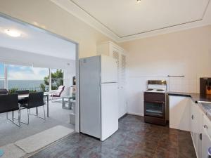 A kitchen or kitchenette at 84 Ocean Parade