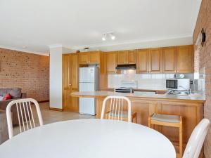 A kitchen or kitchenette at Grand Pacific 2 Unit 1