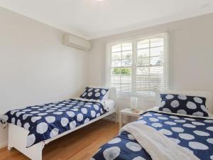 Ein Bett oder Betten in einem Zimmer der Unterkunft 31 McMillan Crescent, Dalmeny