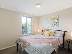 Katil atau katil-katil dalam bilik di Luxury Boardwalk Apartment Unit 7