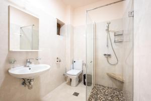 Koupelna v ubytování Apartament Hotel H