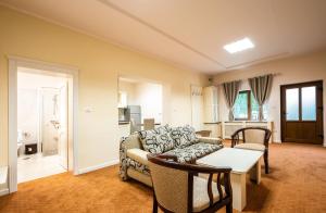 Posezení v ubytování Apartament Hotel H