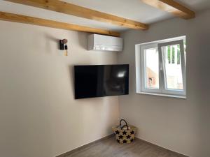 TV a/nebo společenská místnost v ubytování Villa Piscitelli
