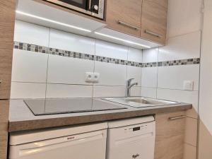 Dapur atau dapur kecil di Appartement Plagne Soleil, 2 pièces, 4 personnes - FR-1-455-96