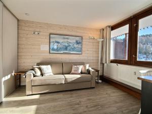 Appartement La Plagne, 3 pièces, 6 personnes - FR-1-455-104にあるシーティングエリア