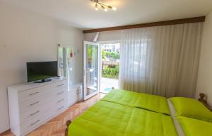 Posteľ alebo postele v izbe v ubytovaní Apartments Ursic