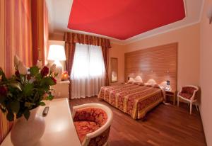 Voodi või voodid majutusasutuse Hotel Cles toas