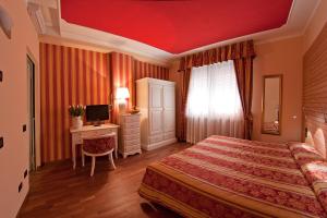 Voodi või voodid majutusasutuse Hotel Cles toas