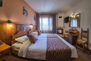Postel nebo postele na pokoji v ubytování Hotel Victoria