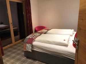Postel nebo postele na pokoji v ubytování Ferienwohnung Waldglück