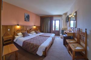 Postel nebo postele na pokoji v ubytování Hotel Victoria