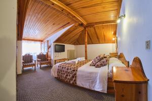 Postel nebo postele na pokoji v ubytování Hotel Victoria