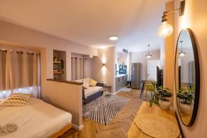 a small room with two beds and a mirror at Eilat vacation house דירות נופש אילת in Eilat