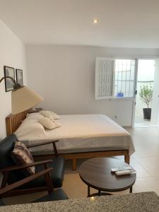 Postel nebo postele na pokoji v ubytování Maison Alriad - Alojamiento familiar tranquilo cerca del mar con jardín, porche y parking privado en el interior de la finca no apto para fiestas