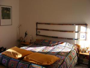 Ένα ή περισσότερα κρεβάτια σε δωμάτιο στο Bed & Breakfast La Gaggiaspina