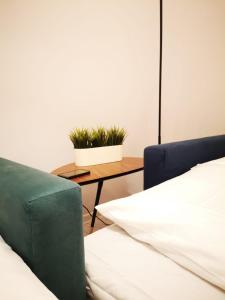 Кровать или кровати в номере Apartamenty LENA 2