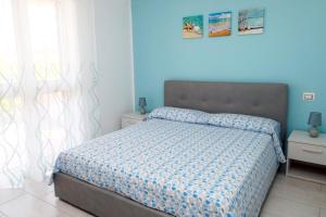 Posteľ alebo postele v izbe v ubytovaní B&B Torre Nave