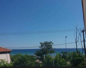 a view of the ocean from a house at Velika seaside Apartment in Velika