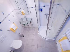 Koupelna v ubytování Hotel Harmonie