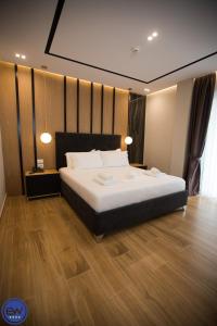 Postel nebo postele na pokoji v ubytování Blue Water Hotel Ksamil