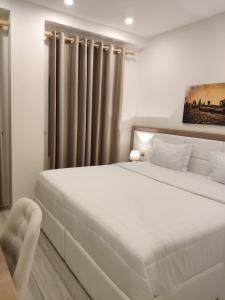 Letto o letti in una camera di Hotel TREVA