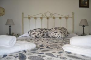 Un pat sau paturi într-o cameră la Casa Serramar - La Cala del Moral - Málaga